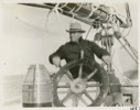 Image of Dr. Adelbert F. Fernald at wheel of Bowdoin